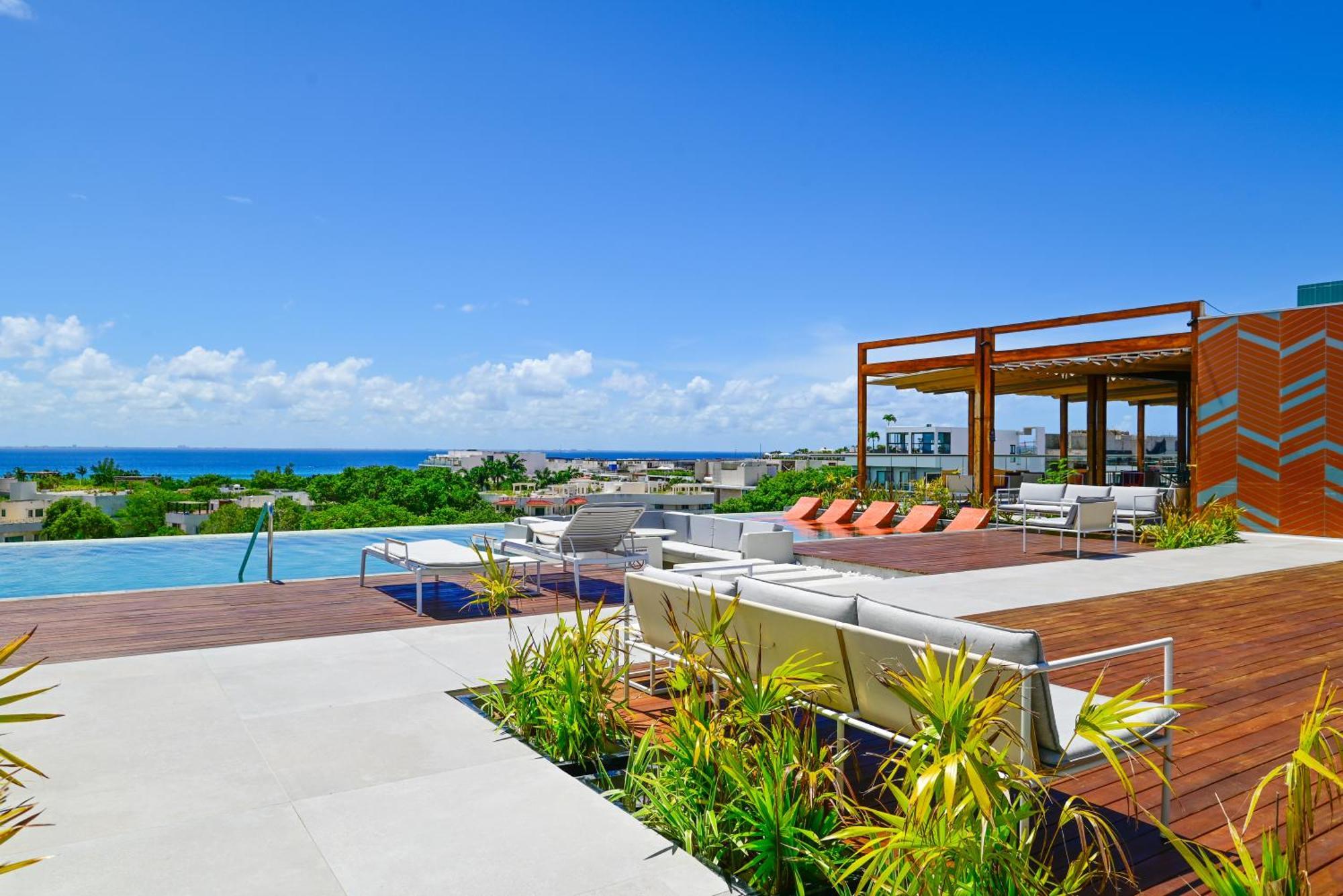 Hotel Aloft Playa Del Carmen Esterno foto Rooftop pool at the Grand at Moon Palace
